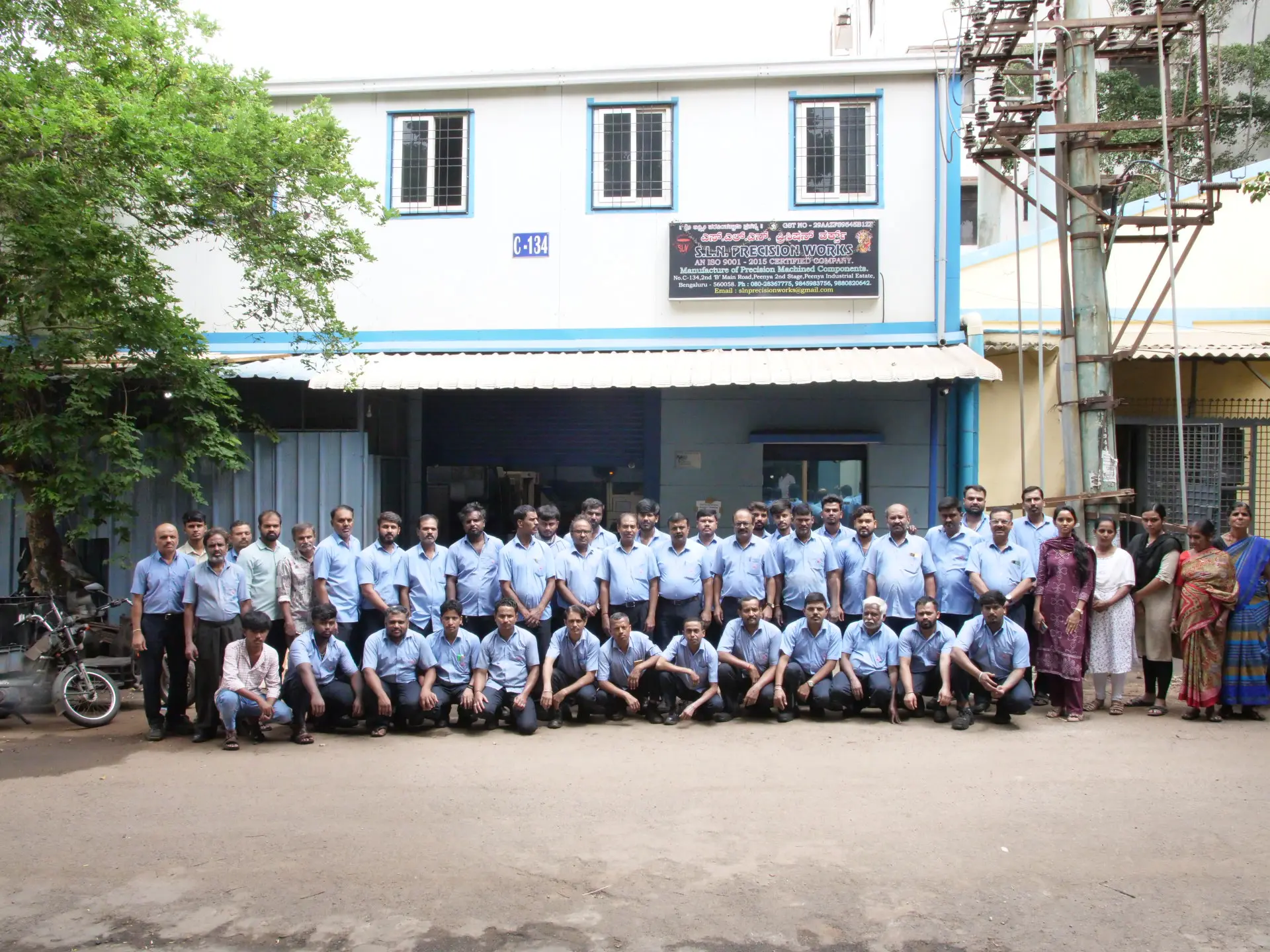 The S.L.N. Precision Works team at the Peenya manufacturing unit